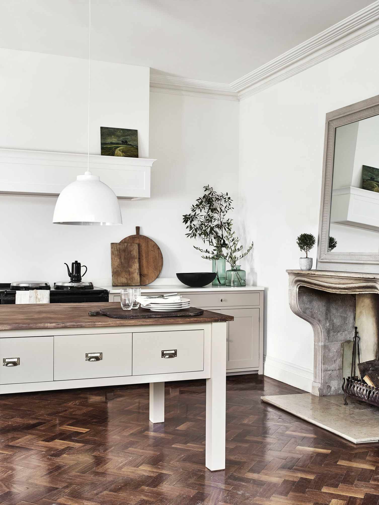 Traditional kitchen: cream kitchen with island and wooden floor