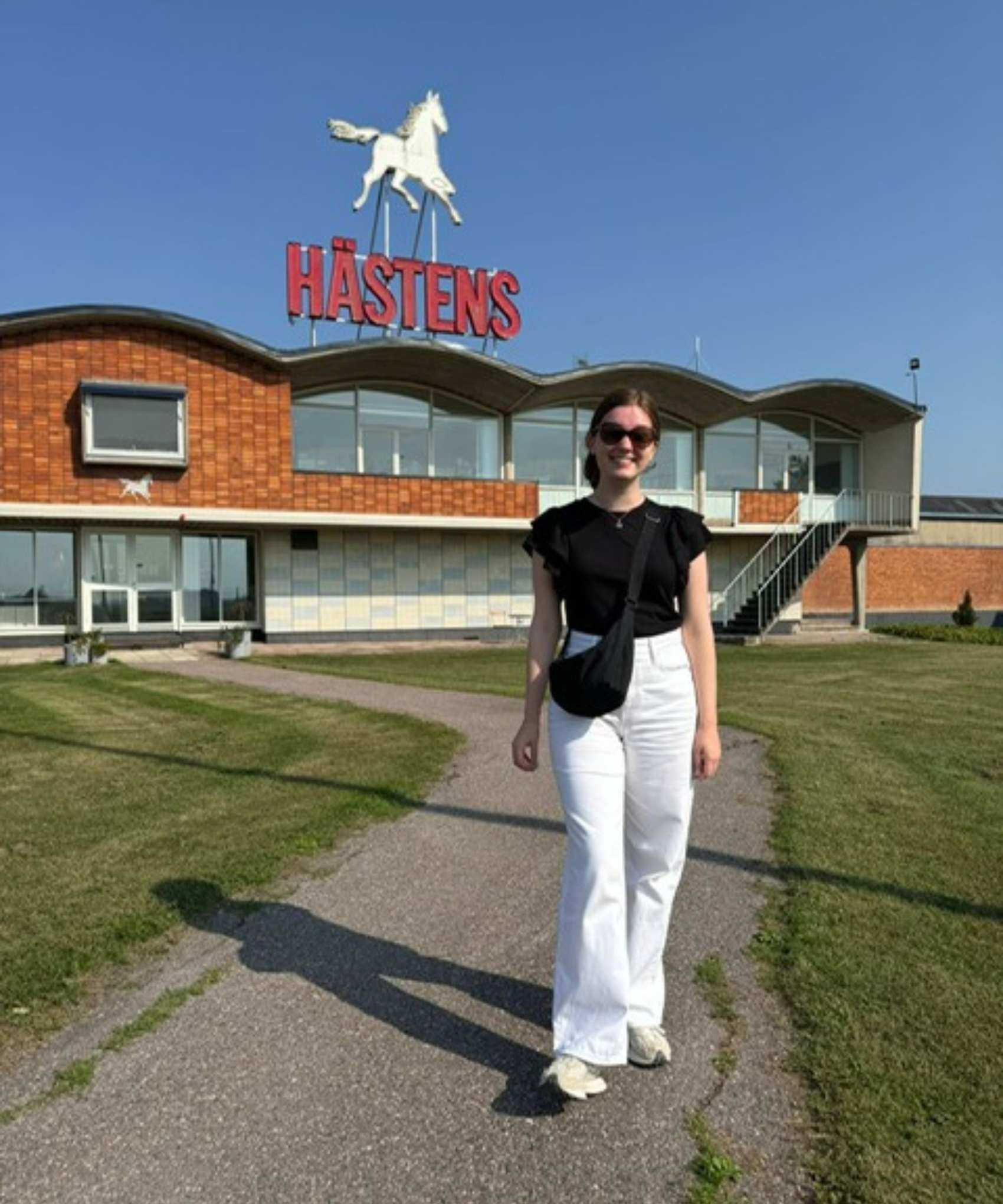 Emilia standing outside the H&auml;stens factory.