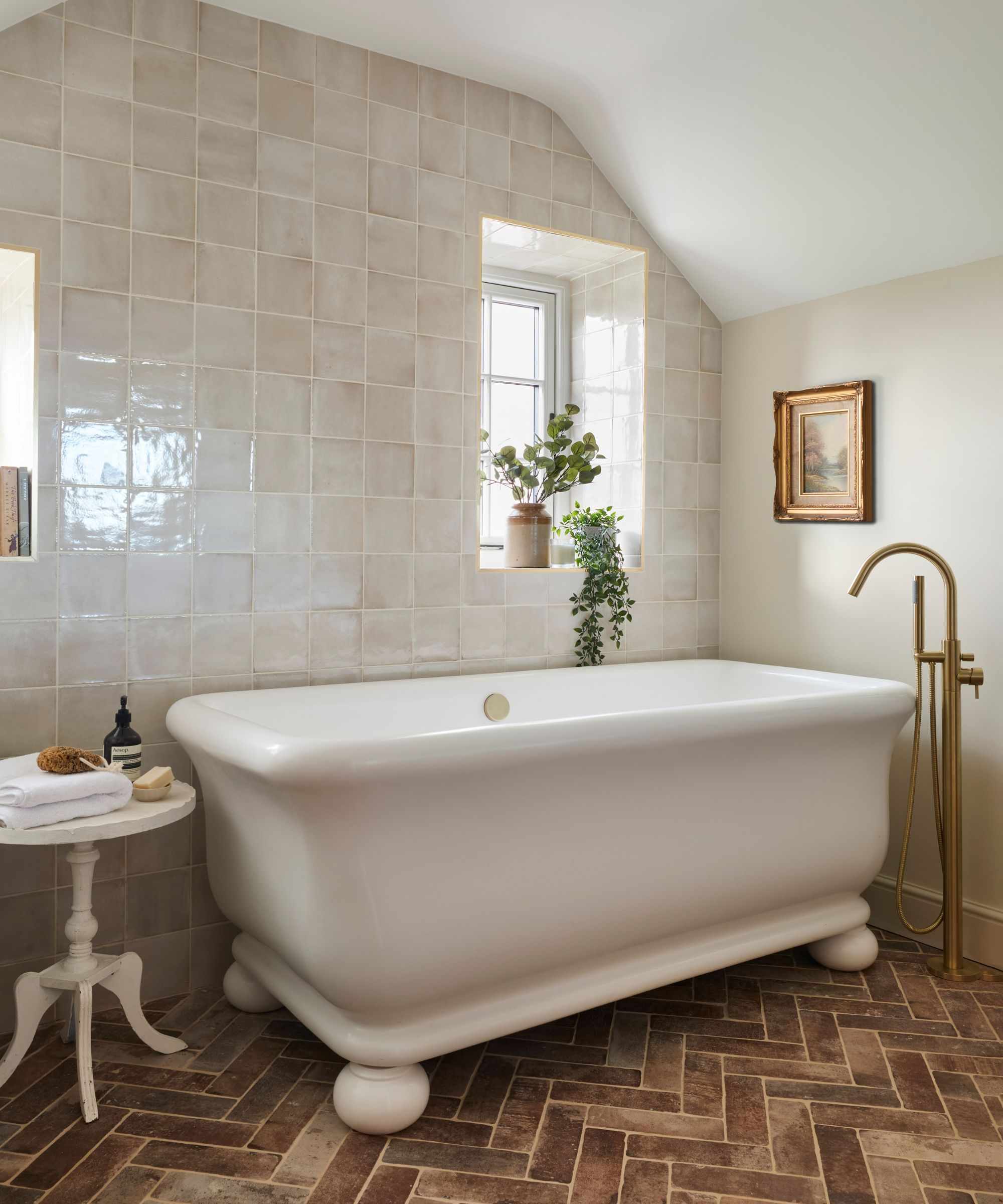 freestanding bathtub in a transitional bathroom