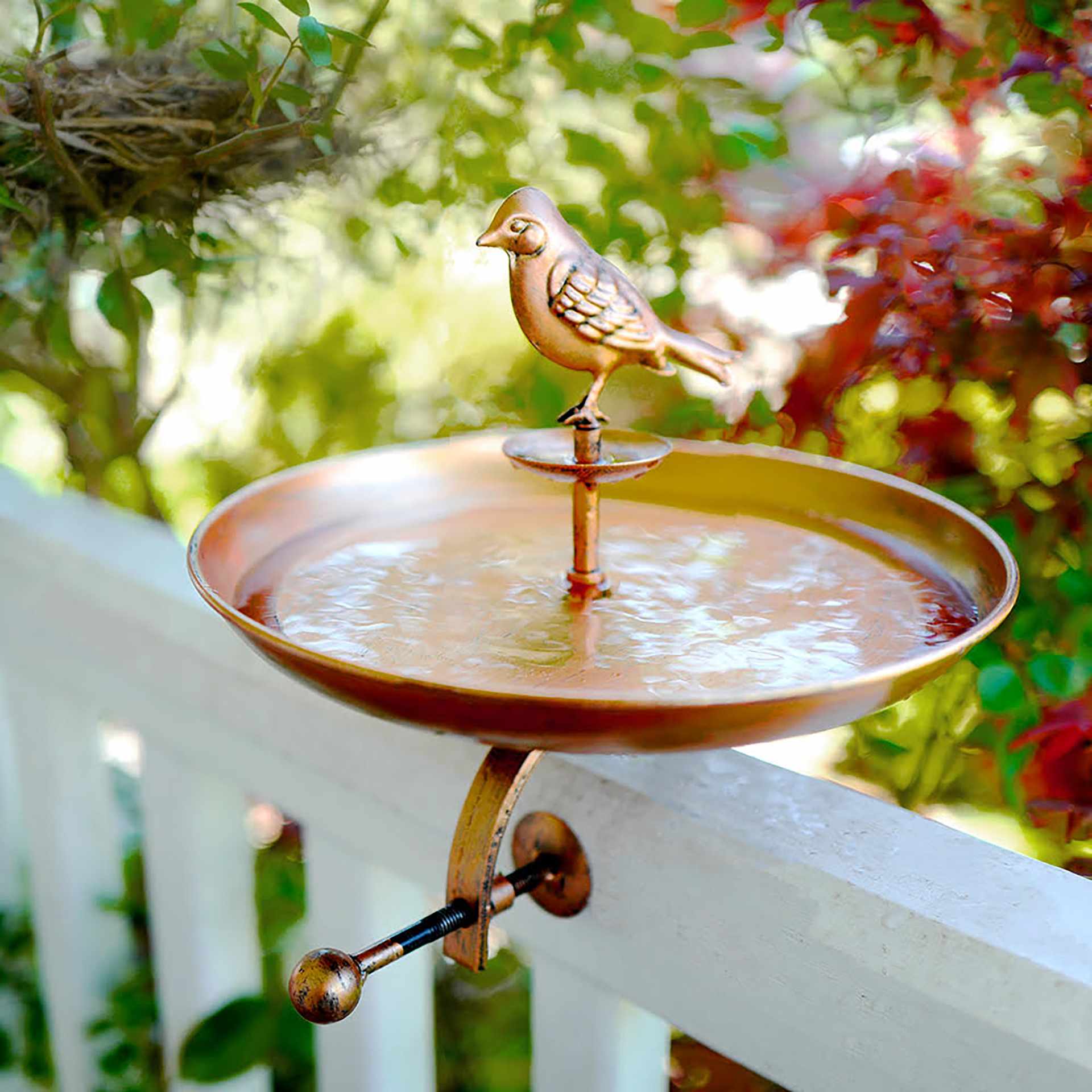 bird bath on decking fence