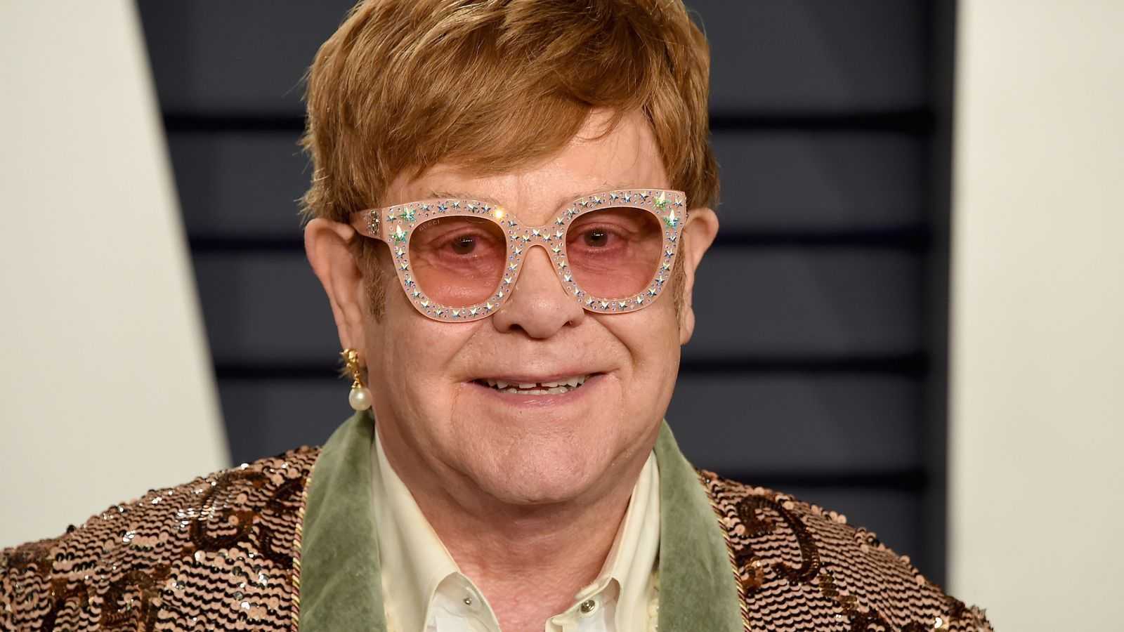 Elton John's Sunny 2000s Living Room Hints at Where The Butter Yellow Trend Is Headed Next – Gold Fabric Will be Everywhere in 2026