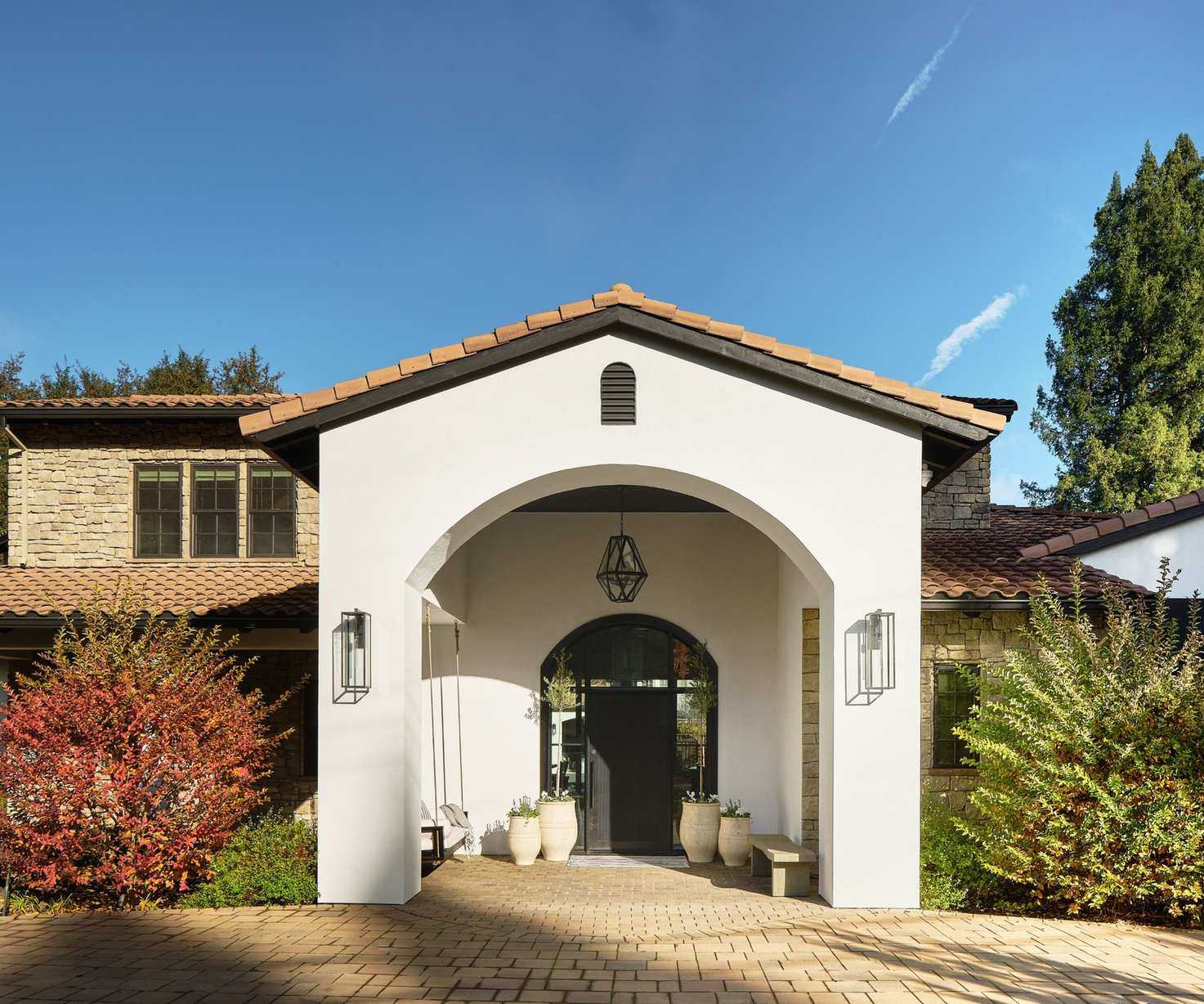 Mediterranean home exterior with white render