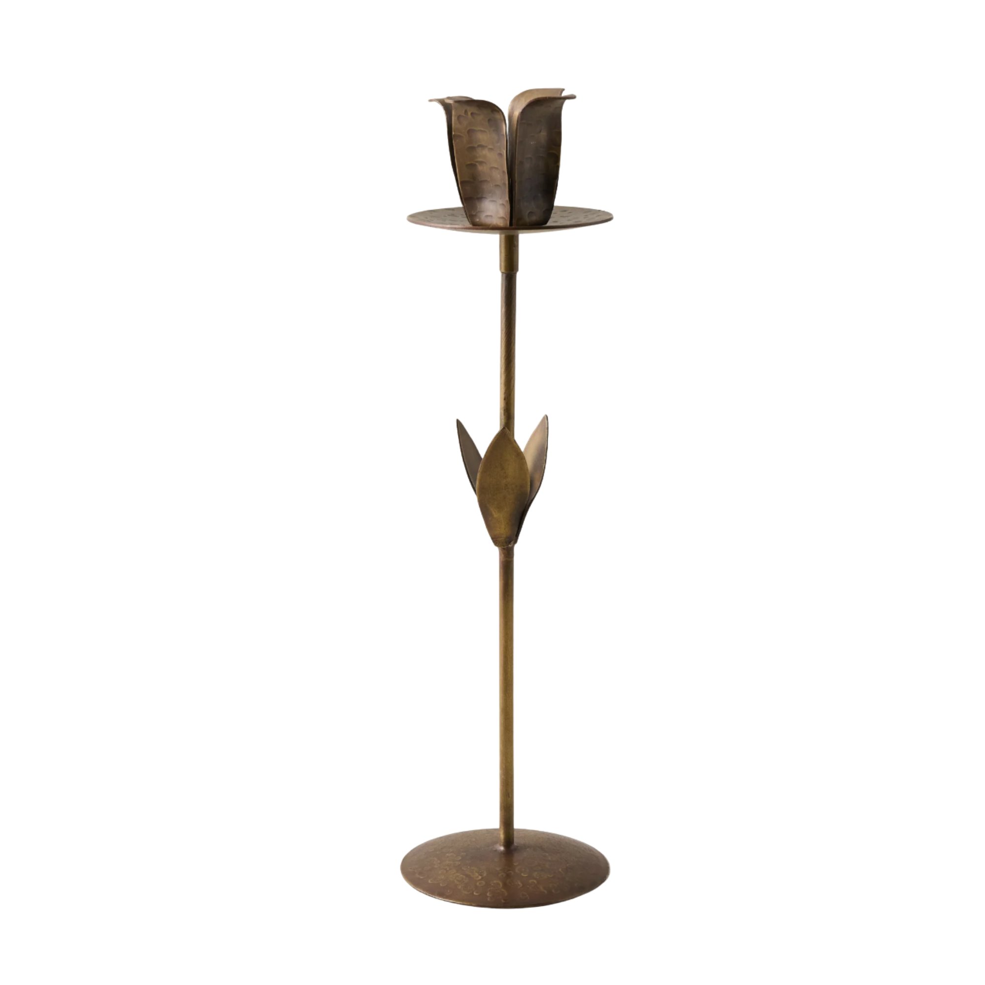 a brass flower candle holder