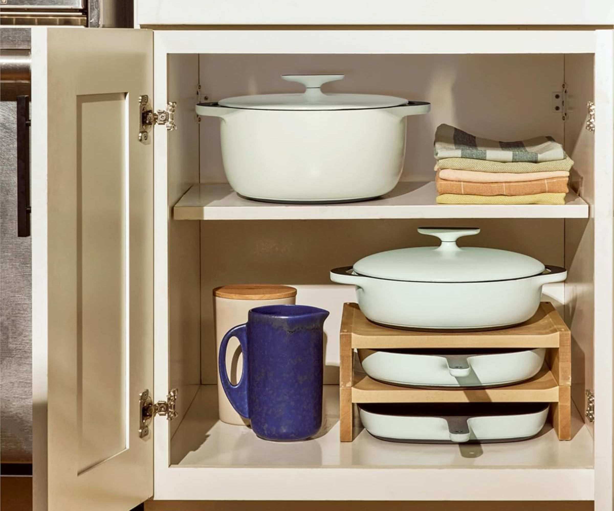Caraway cookware in a cabinet