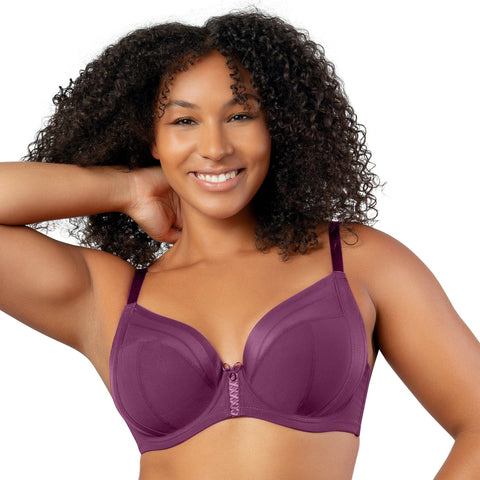 A full-chested woman in a purple plunge-neck bra