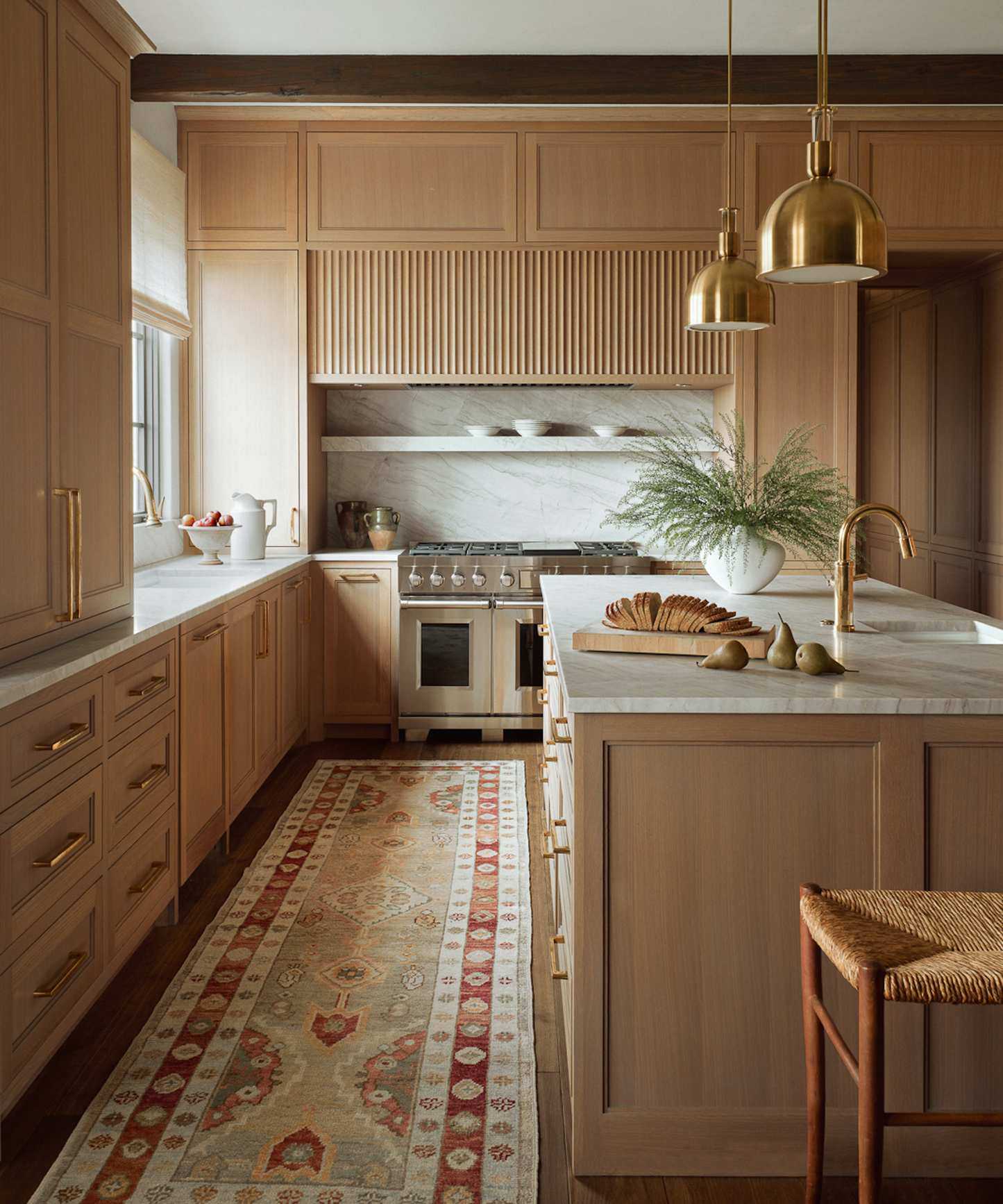 timber kitchen with island and patterned runner rug