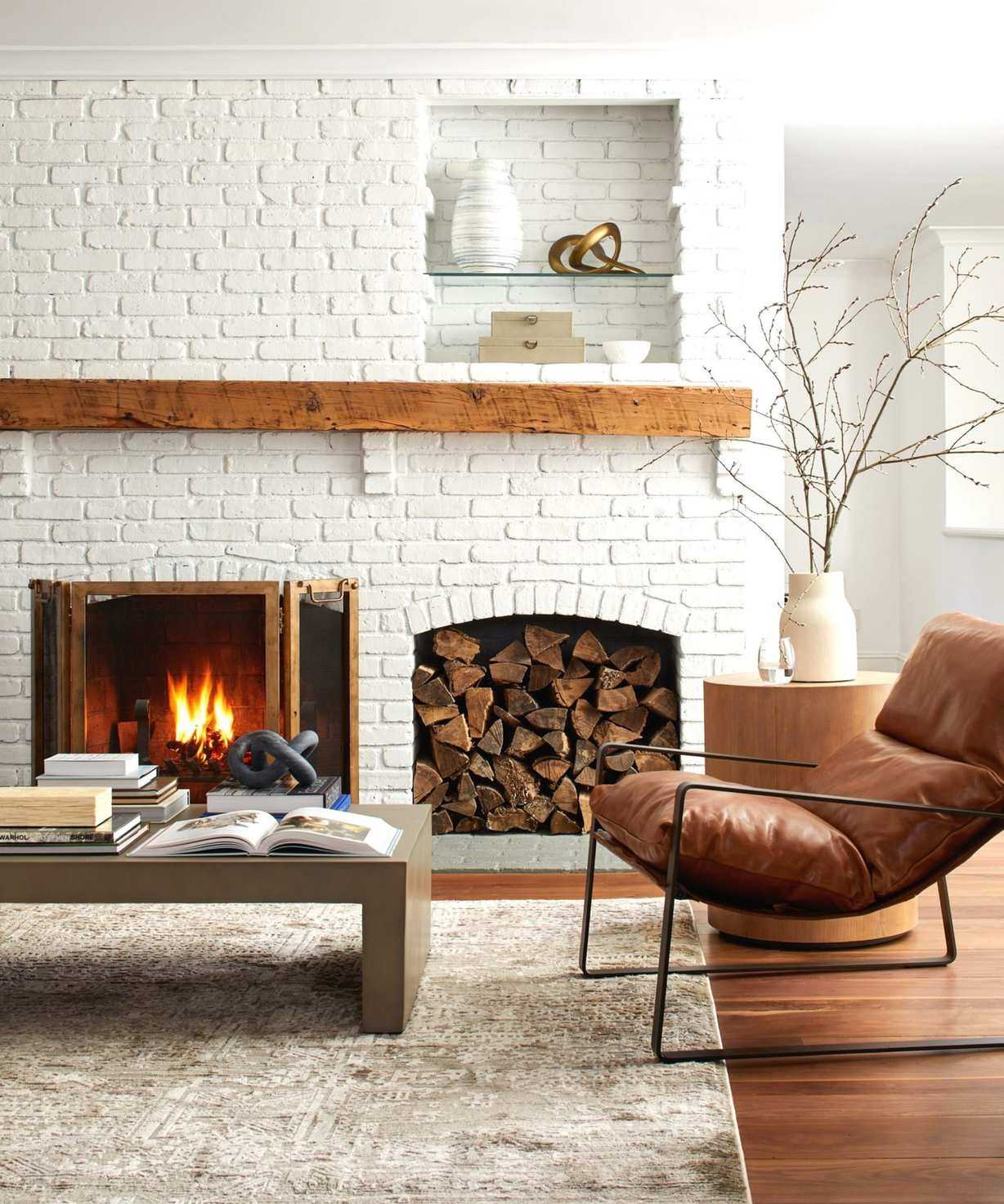 kathy kuo painted exposed brick living room design