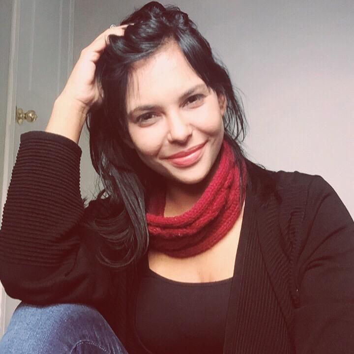 Profile photo of Lina DaSilva with red scarf