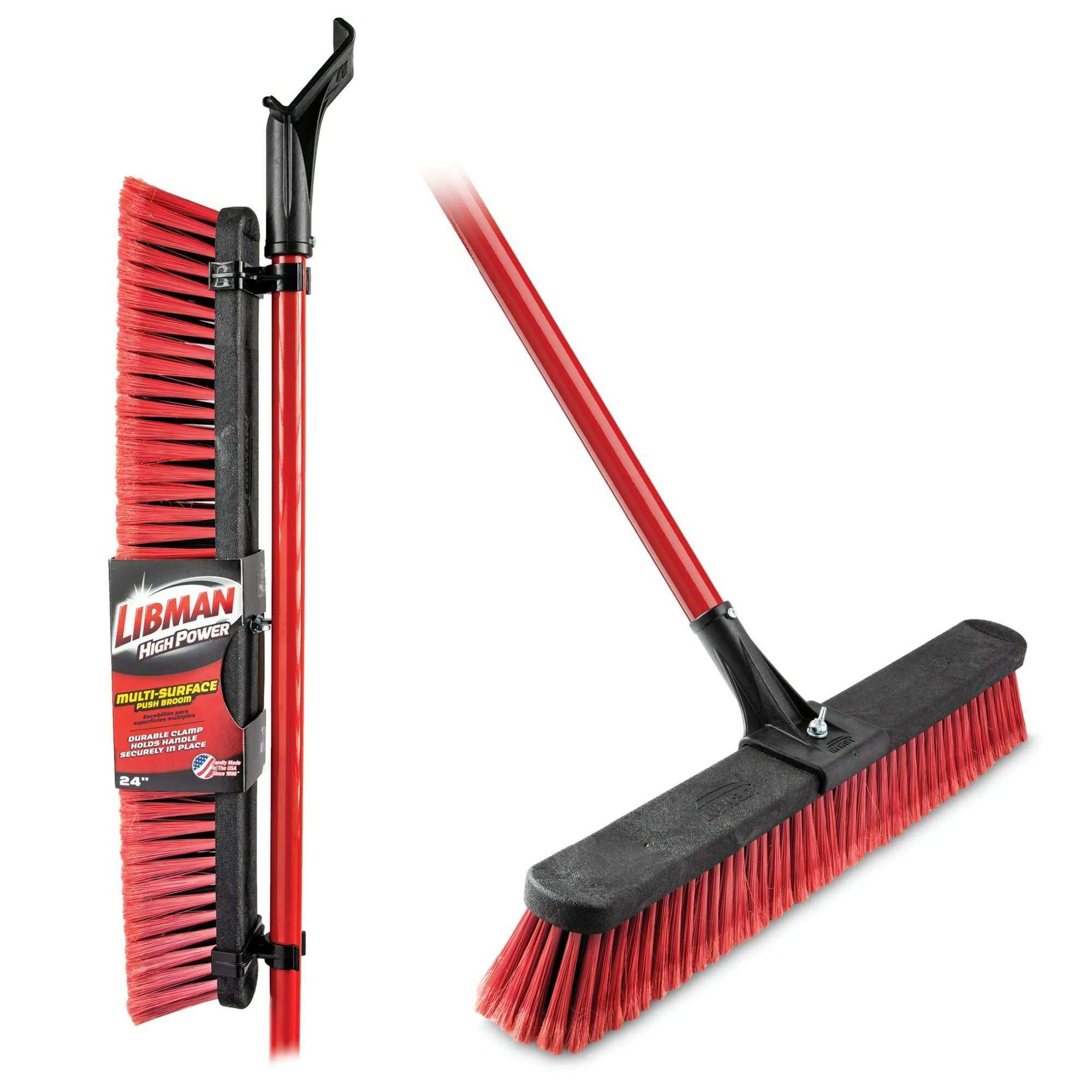 A black and red outdoor broom