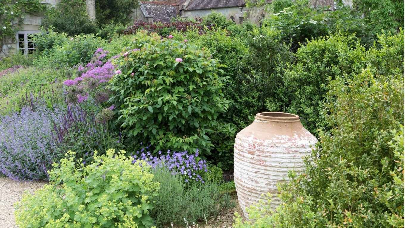 How to reuse old planters in the garden – 5 beautiful ways to give your pots a second lease on life