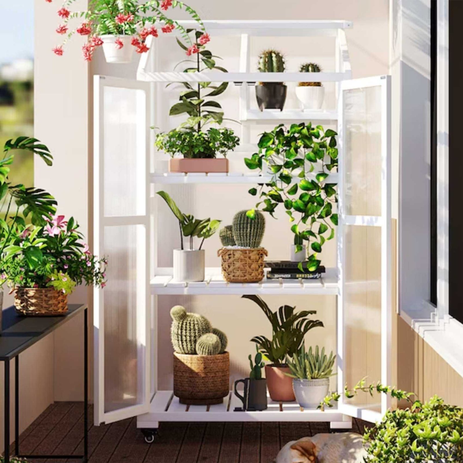 white mini greenhouse on a balcony